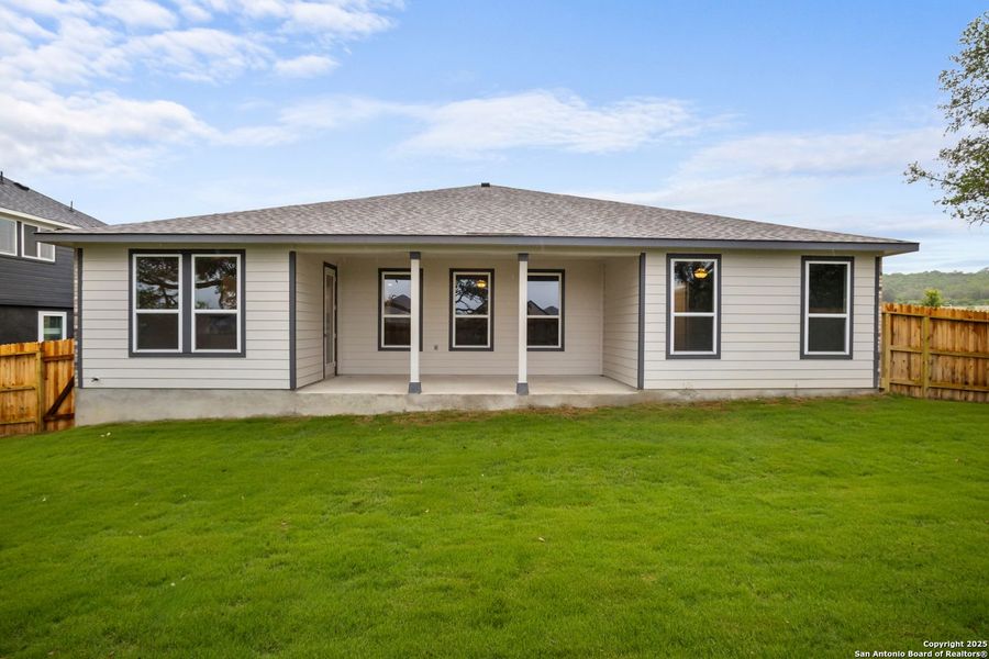 Front exterior of a new home in The Reserve at Potranco Oaks, Castroville, TX, highlighting curb appeal (Image 66).