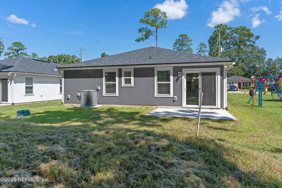 Front exterior of a new home in , Jacksonville, FL, highlighting curb appeal (Image 23).