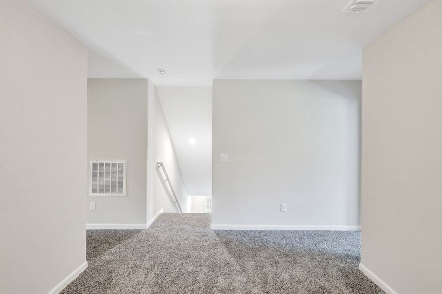 Representative unfurnished interior of a home built from the The Dublin by Smith Family Homes in Settlers Hammock, Kingsland (Image 30).
