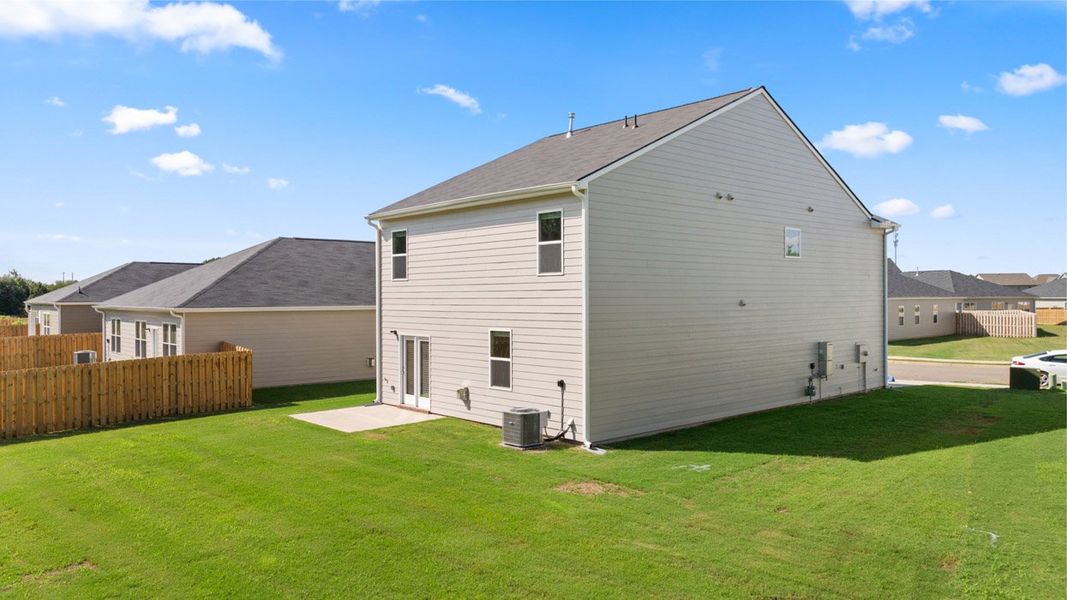 Exterior details and patio area of a home in Highland Hills, Graniteville (Image 3).