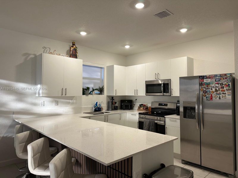 Furnished interior view inside a new home in Beacon at Galiano Pointe, Miami (Image 4).