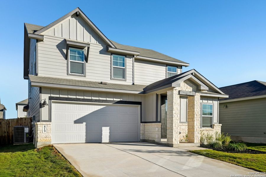 Front exterior of a new home in Estancia Ranch - Premier Series, San Antonio, TX, highlighting curb appeal (Image 23).