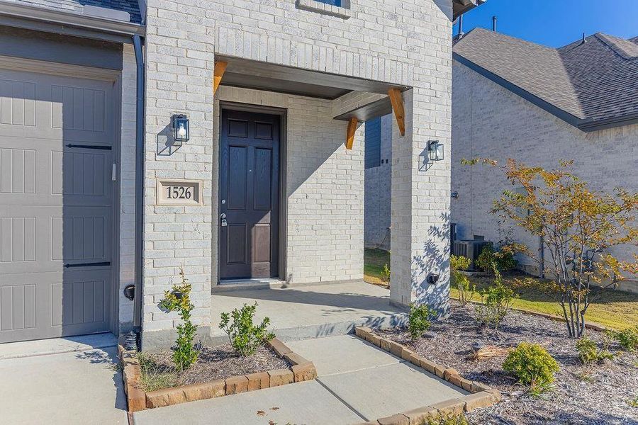 Exterior details and patio area of a home in Devonshire, Forney (Image 3).