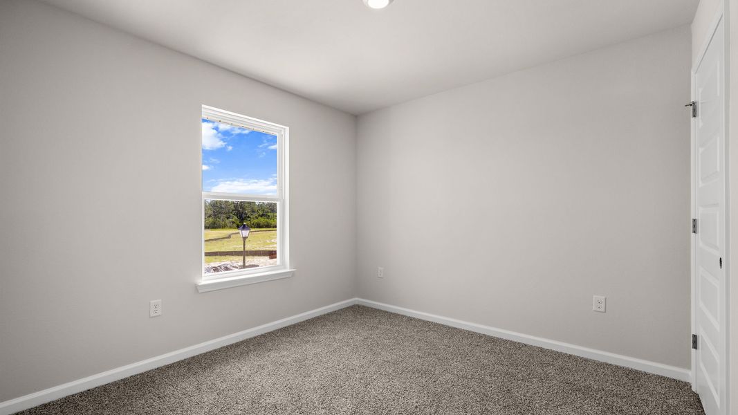 Representative unfurnished interior of a home built from the The Canmore by D.R. Horton in Salt Pines, Port Saint Joe (Image 28).