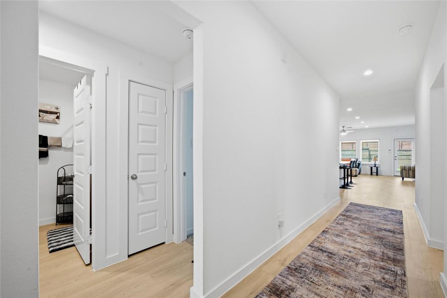 As you enter this lovely home, there are 2 secondary bedrooms and a full bath to the left.