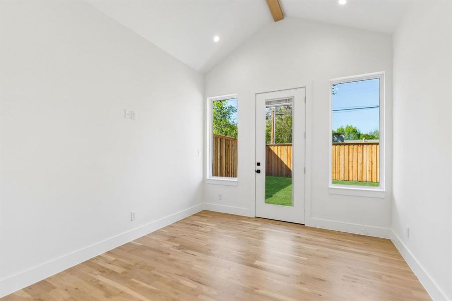 Entryway featuring wood finished floors, recessed lighting, and beamed ceiling
