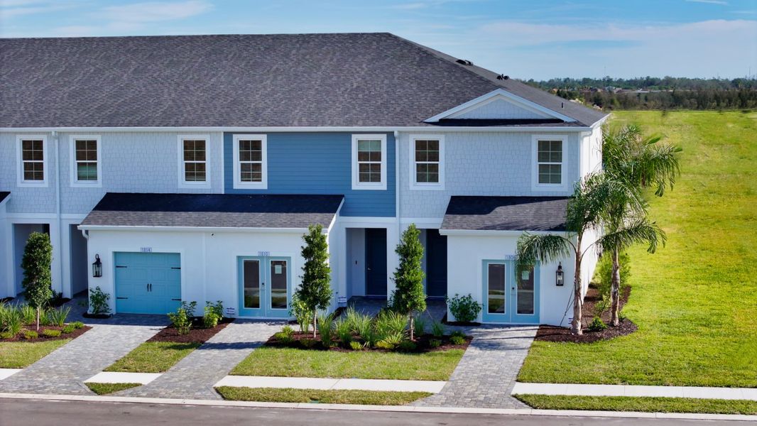 Representative exterior photo of a completed home built from the Avery by Neal Communities in Palm Grove, Bradenton, FL (Image 2). Representative exterior photo of a completed home built from the Avery by Neal Communities in Palm Grove, Bradenton, FL (Image 2).