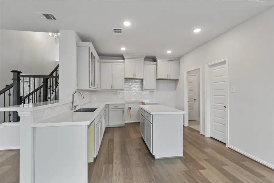 Furnished interior view inside a new home in Park at Eldridge, Sugar Land (Image 5). Furnished interior view inside a new home in Park at Eldridge, Sugar Land (Image 5).