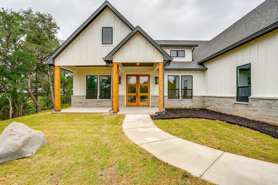 Representative exterior photo of a completed home built from the Cherry Laurel by Trinity Classic Homes in Zion Trails, Poolville, TX (Image 24). Representative exterior photo of a completed home built from the Cherry Laurel by Trinity Classic Homes in Zion Trails, Poolville, TX (Image 24).