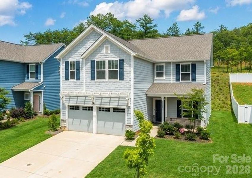 Front exterior of a new home in , Lancaster, SC, highlighting curb appeal (Image 21).