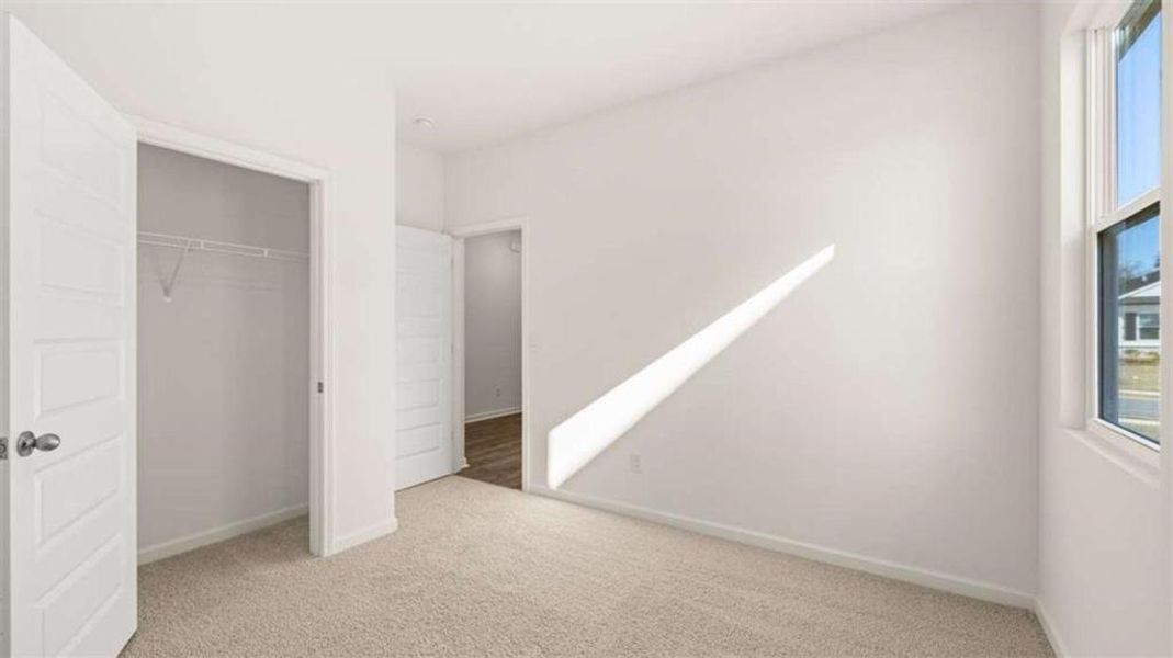 Spacious, unfurnished interior of a new home in Oakchase at Hampton, Hampton (Image 34).