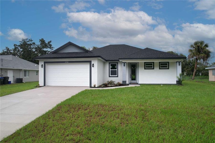 Front exterior of a new home in , North Port, FL, highlighting curb appeal (Image 29).