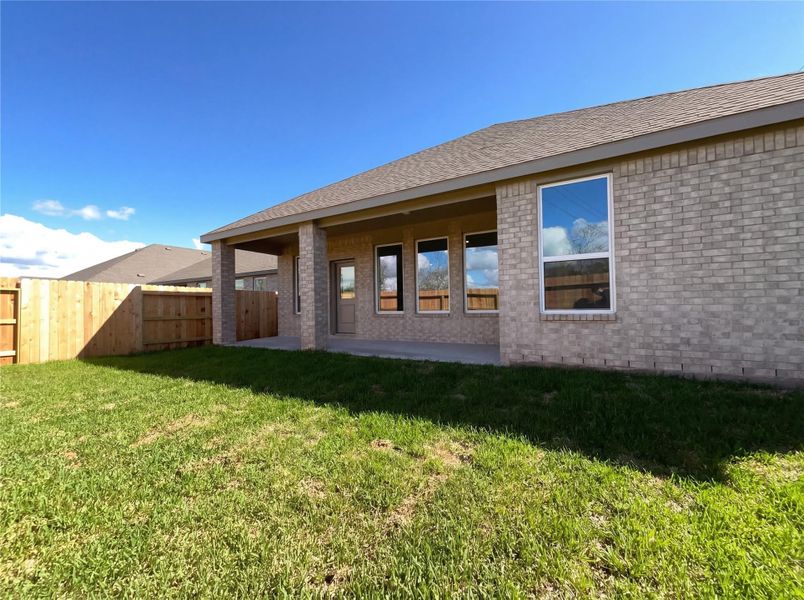 Exterior details and patio area of a home in Sunterra, Katy (Image 2). Exterior details and patio area of a home in Sunterra, Katy (Image 2).
