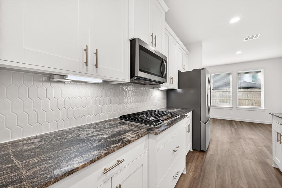 Furnished interior view inside a new home in Harvest Green, Richmond (Image 10).