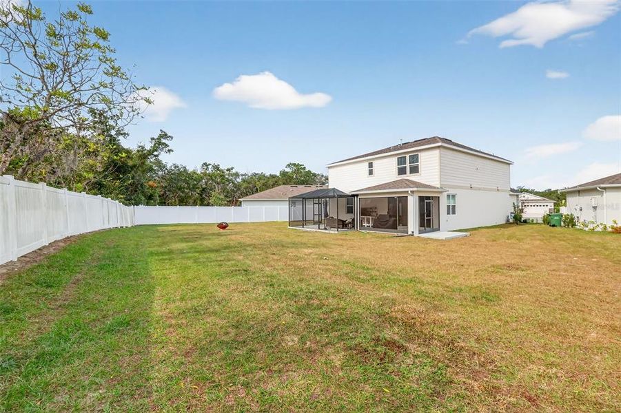 Exterior details and patio area of a home in Seasons at Spring Creek, Okahumpka (Image 26). Exterior details and patio area of a home in Seasons at Spring Creek, Okahumpka (Image 26).