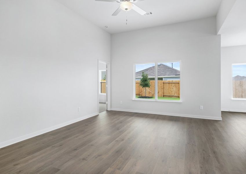 The family room has a large window that lets in great, natural light.