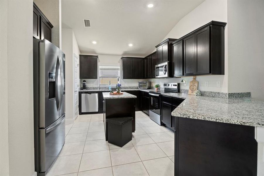 Furnished interior view inside a new home in , Harmony (Image 11).