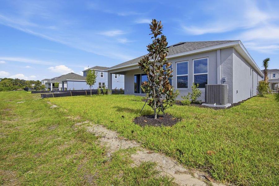Exterior details and patio area of a home in Indigo Creek, Apollo Beach (Image 3).