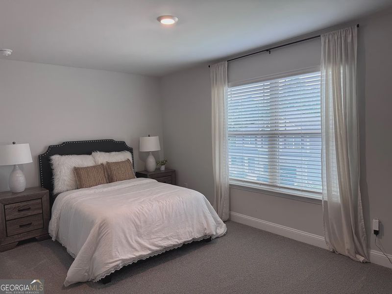 Furnished interior view inside a new home in Magnolia Villas, Cornelia (Image 17).