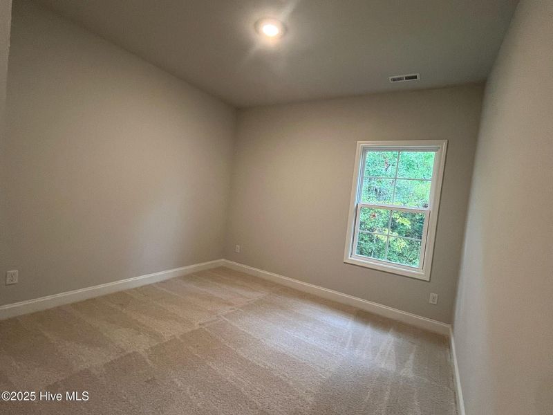 Spacious, unfurnished interior of a new home in Palmetto Creek, Bolivia (Image 25).