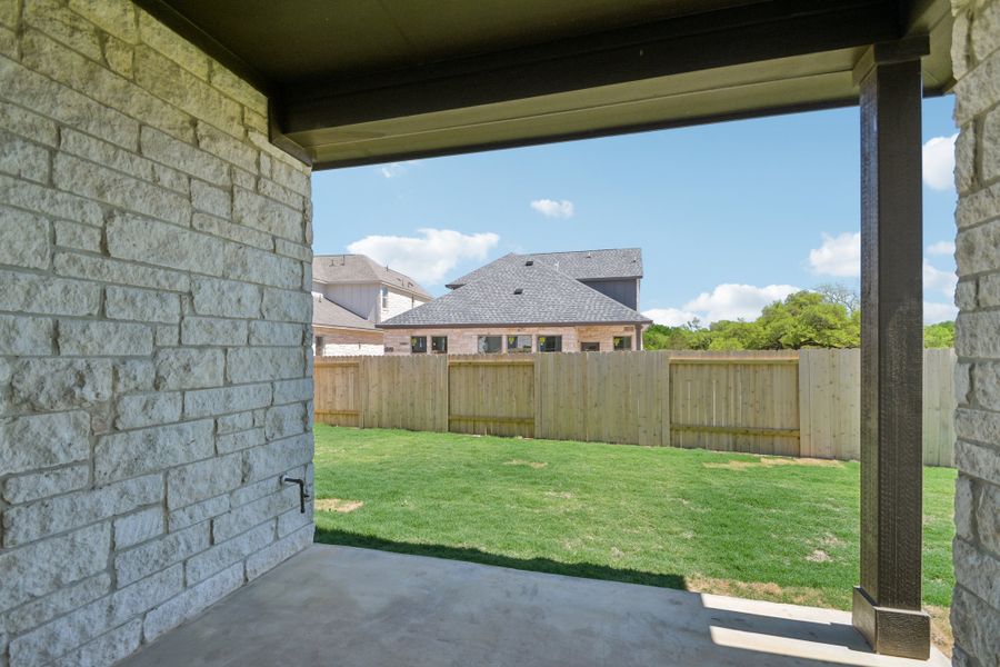 Exterior details and patio area of a home in Persimmon, Buda (Image 3).