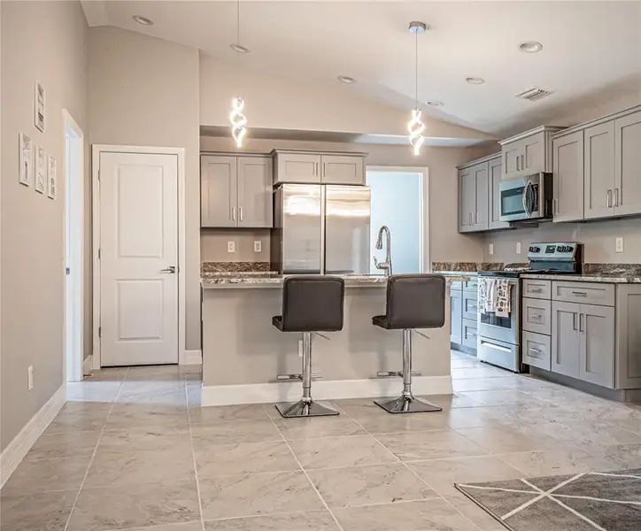 Furnished interior view inside a new home in , Punta Gorda (Image 6). Furnished interior view inside a new home in , Punta Gorda (Image 6).