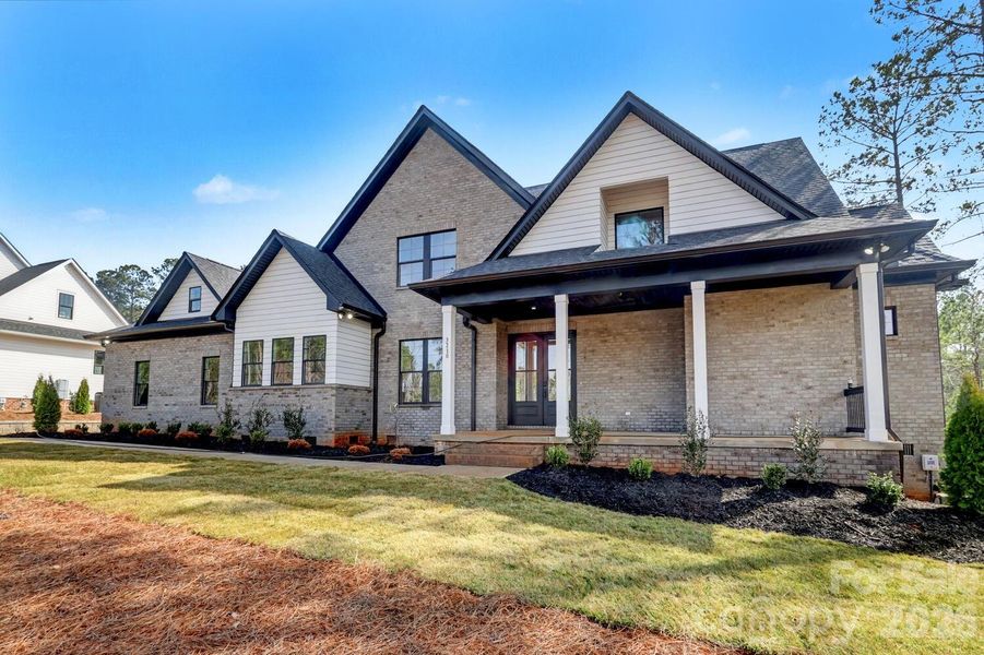 Front exterior of a new home in , Lancaster, SC, highlighting curb appeal (Image 2). Front exterior of a new home in , Lancaster, SC, highlighting curb appeal (Image 2).