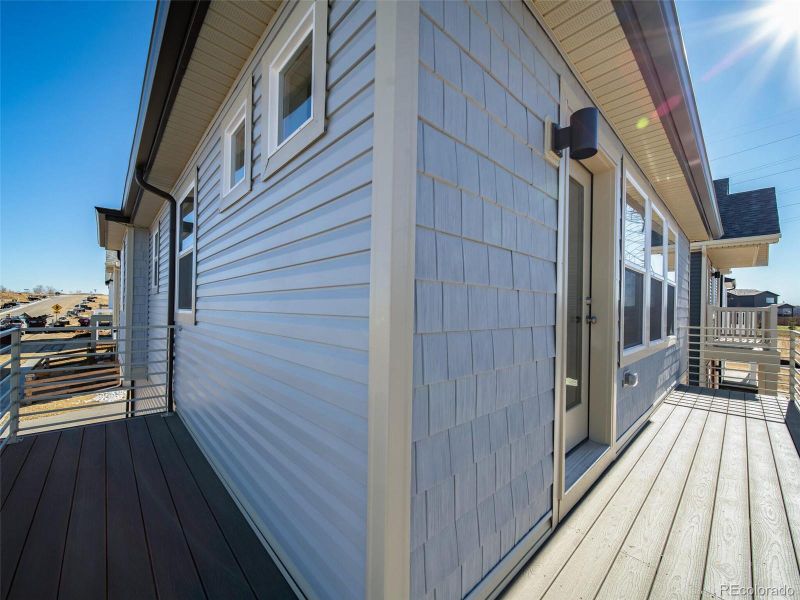Exterior details and patio area of a home in Muegge Farms, Bennett (Image 21).