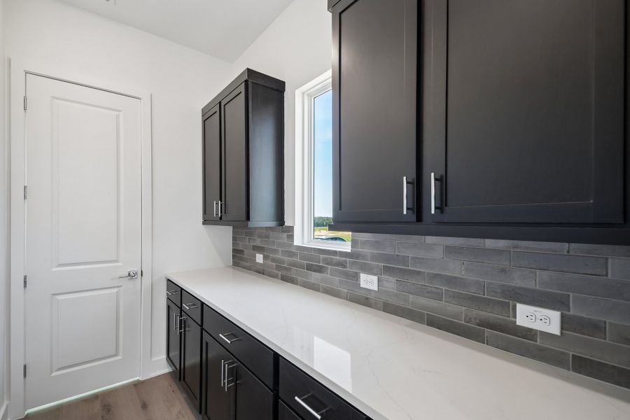 Furnished interior view inside a new home in Freedom at Anthem, Kyle (Image 5).