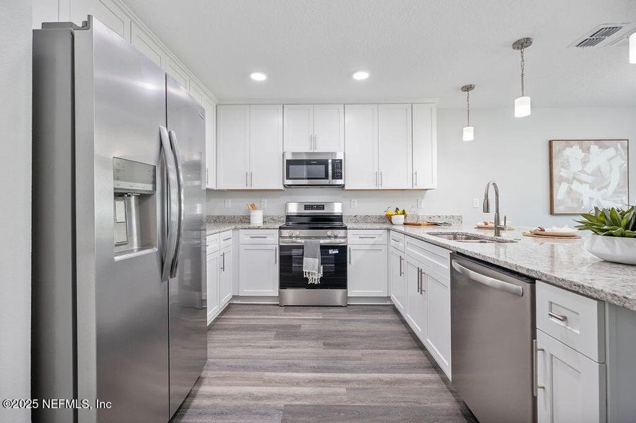 Furnished interior view inside a new home in , Jacksonville (Image 11). Furnished interior view inside a new home in , Jacksonville (Image 11).