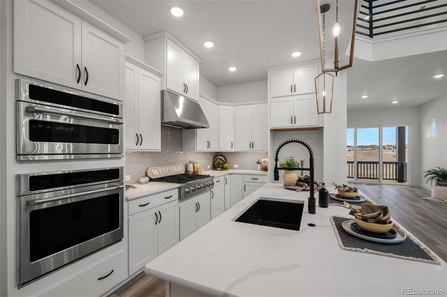Furnished interior view inside a new home in Revel Crossing at Wolf Ranch - The Panorama Collection, Colorado Springs (Image 15).
