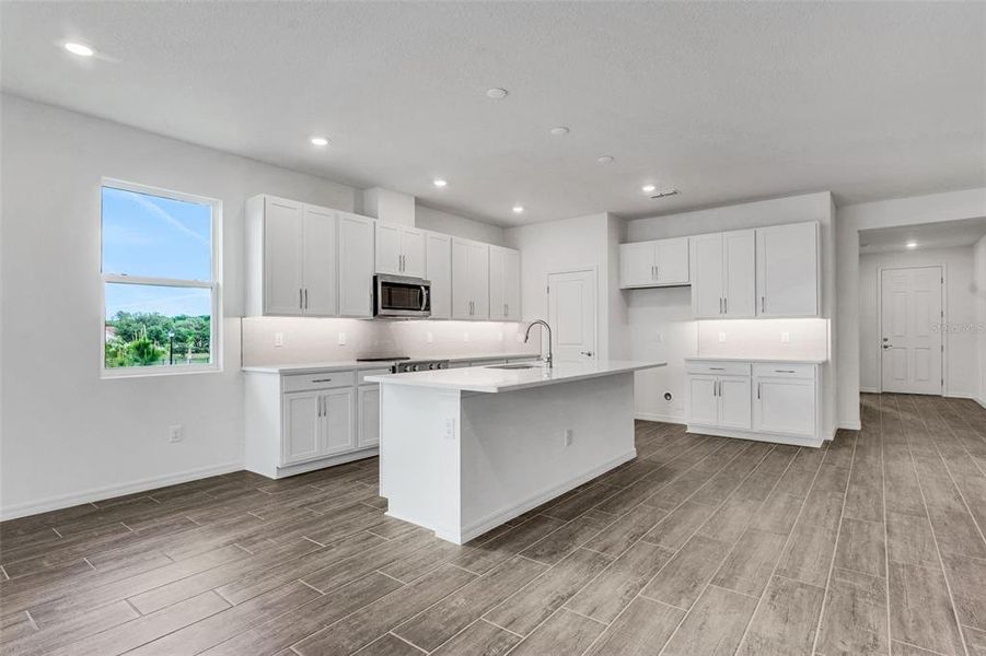 Furnished interior view inside a new home in Tuscan Hills, Dade City (Image 13).