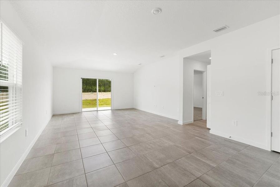 Spacious, unfurnished interior of a new home in Flagler Village - Classic Series, Palm Coast (Image 11). Spacious, unfurnished interior of a new home in Flagler Village - Classic Series, Palm Coast (Image 11).