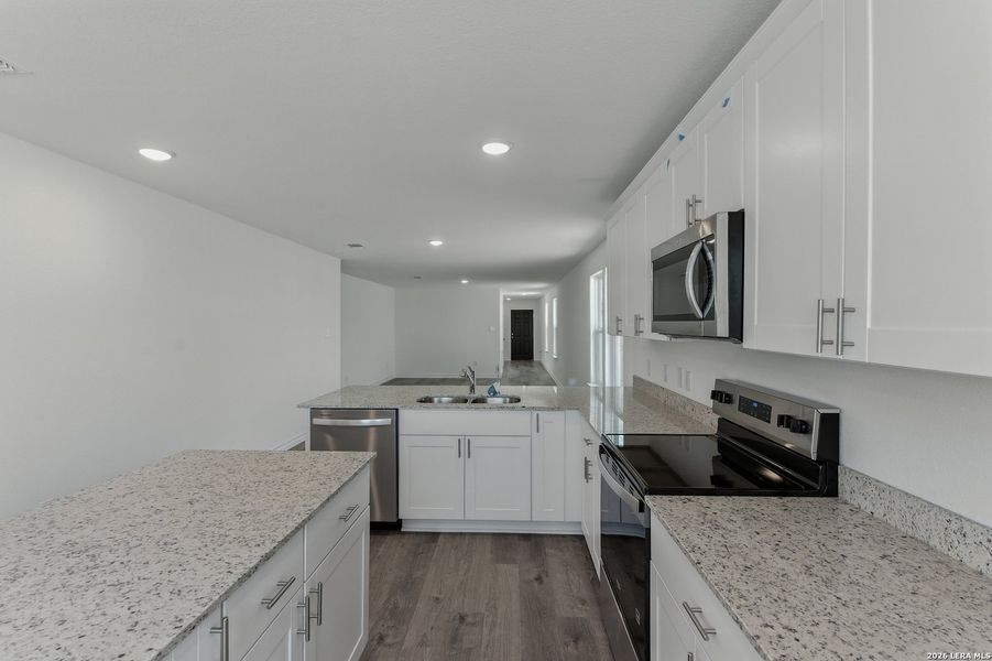 Furnished interior view inside a new home in Cinco Lakes, San Antonio (Image 3).