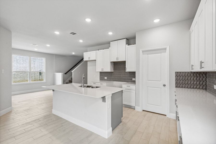 Representative furnished interior of a home built from the Lyla by Megatel Homes in Santorini, Seagoville (Image 4).