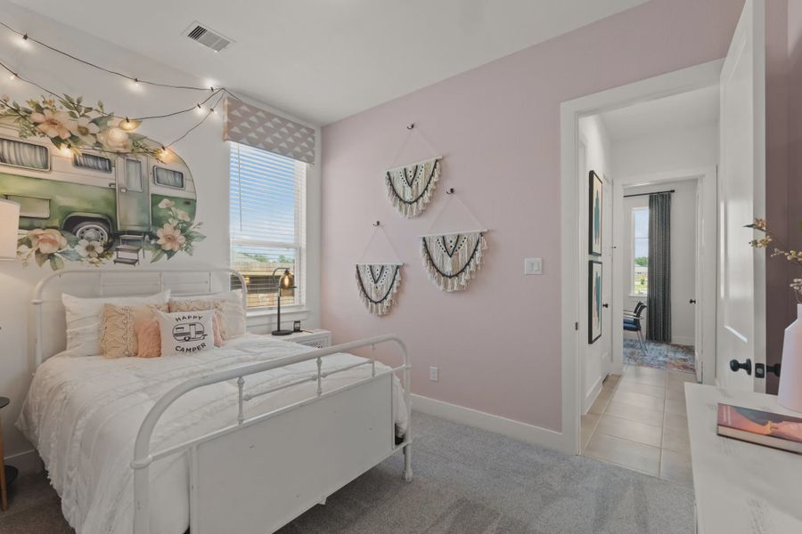 Representative furnished interior of a home built from the Sunnyside by Chesmar Homes in The Trails, New Caney (Image 12).