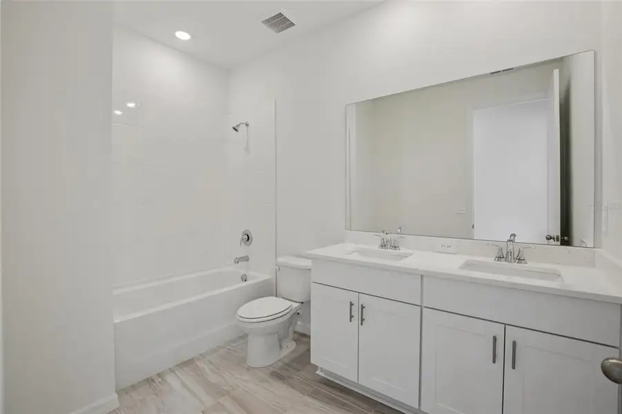 Furnished interior view inside a new home in Coasterra - Reserve Series, Palmetto (Image 10).