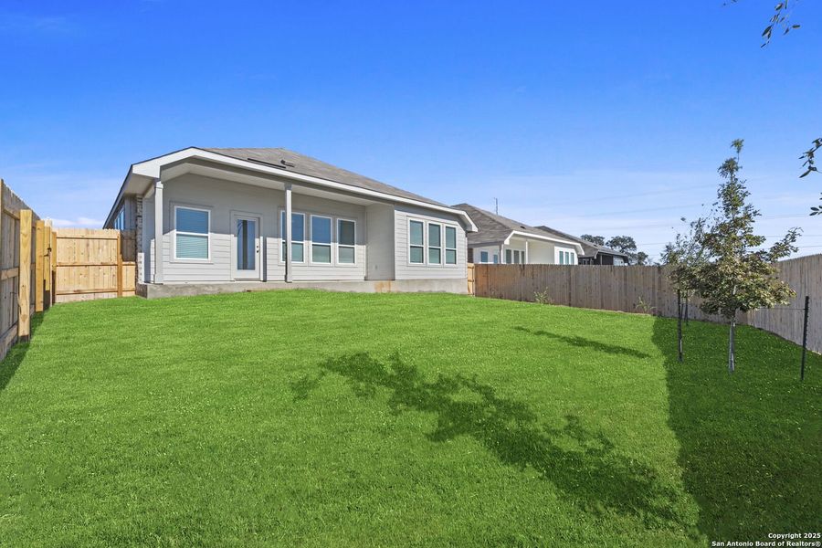 Exterior details and patio area of a home in Gatehouse: Brookstone II Collection, New Braunfels (Image 2).