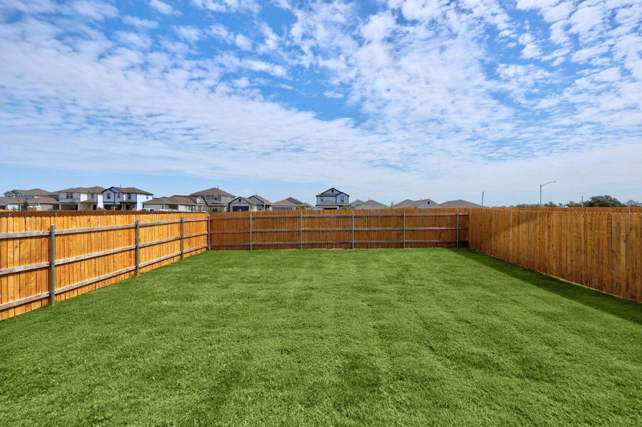 Exterior details and patio area of a home in Trinity Ranch, Elgin (Image 4).