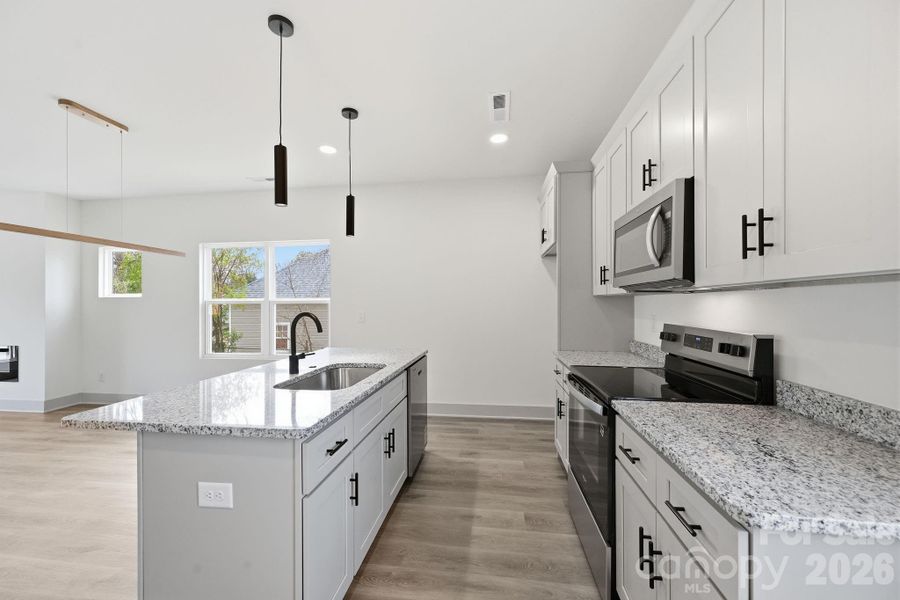 Furnished interior view inside a new home in , Monroe (Image 8).