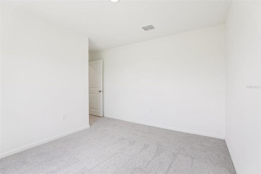 Spacious, unfurnished interior of a new home in The Grove at Scenic Terrace, Lake Hamilton (Image 17).