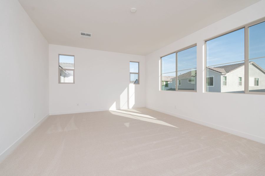 Spacious, unfurnished interior of a new home in Waterston Central, Gilbert (Image 13).