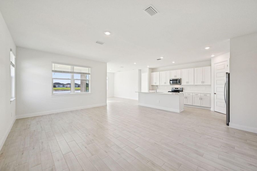 Furnished interior view inside a new home in Brystol at Wylder - Reserve Series, Port St. Lucie (Image 4).