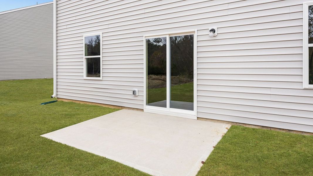 Exterior details and patio area of a home in Villa Grande, Winterville (Image 4).