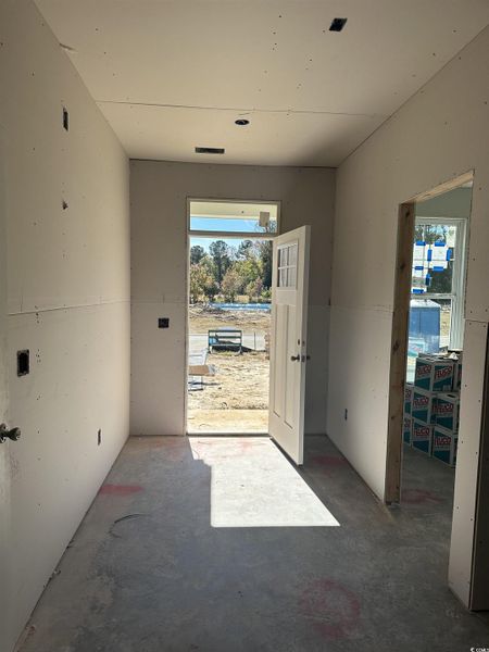 Entryway with concrete flooring