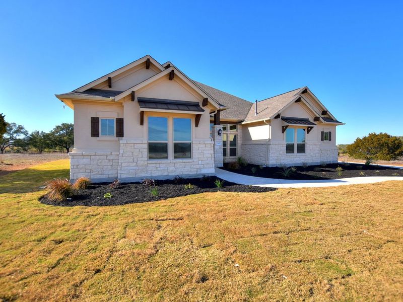 Representative exterior photo of a completed home built from the Siena II by Giddens Homes in Clearwater Ranch, Liberty Hill, TX (Image 39).