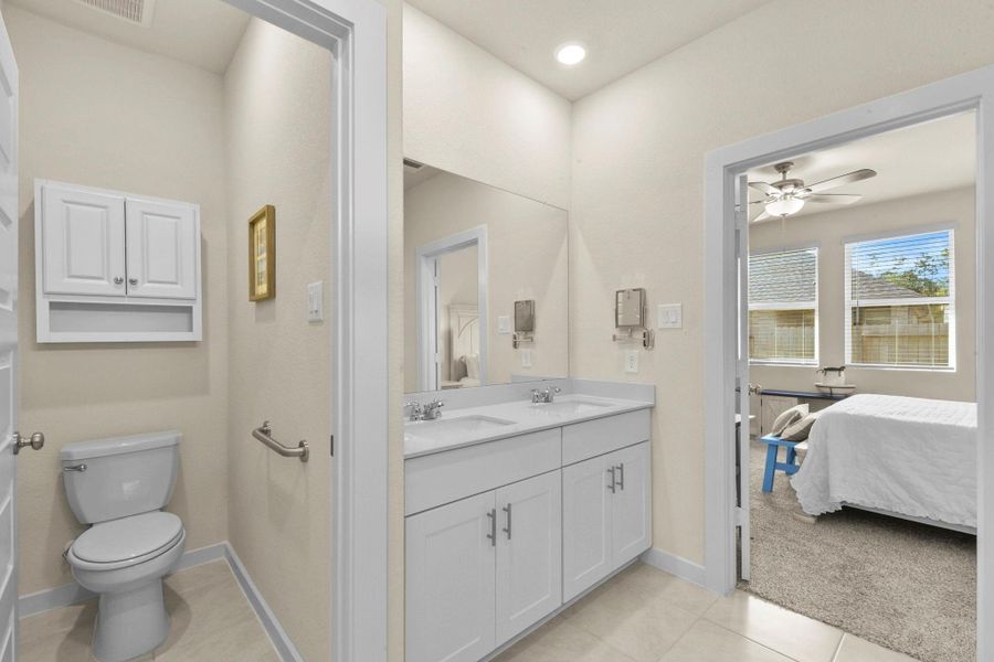 Furnished interior view inside a new home in Harper's Preserve - Traditional Series, Conroe (Image 29).