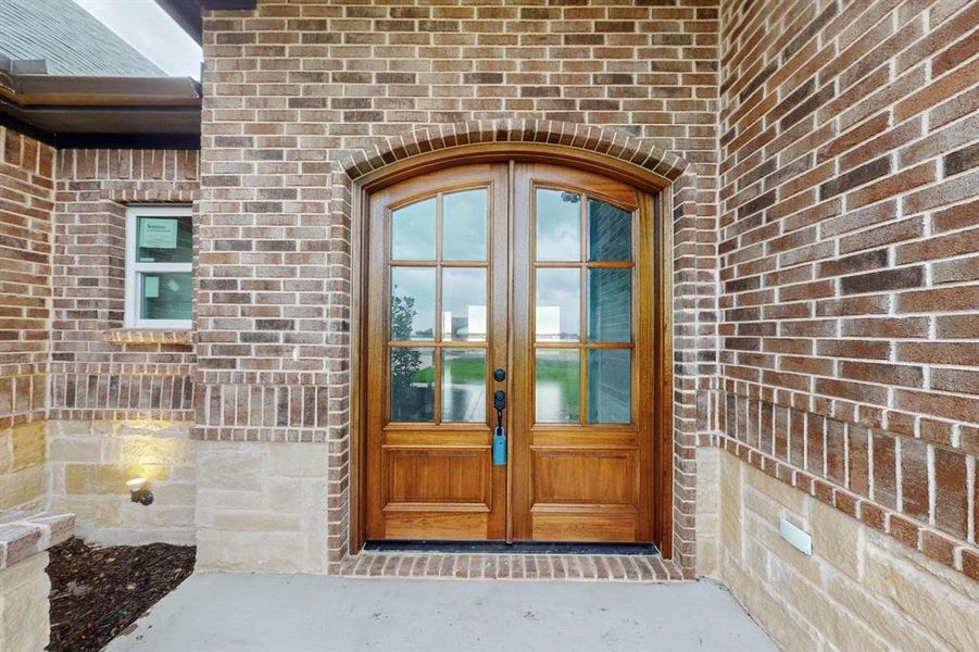 Entrance to property with french doors