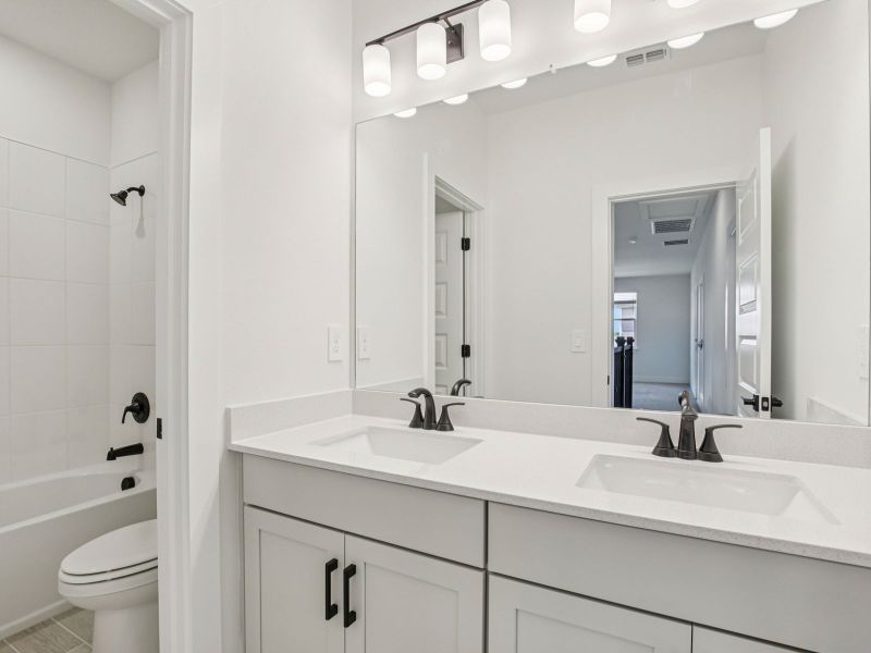 Furnished interior view inside a new home in Magnolia Bay - Reserve Series, Nokomis (Image 7).