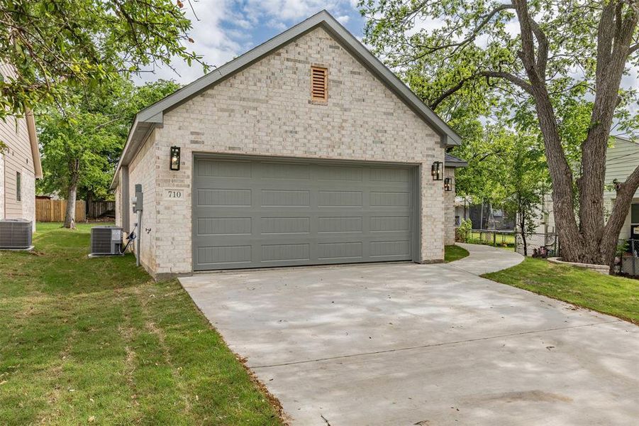 Front exterior of a new home in , Sherman, TX, highlighting curb appeal (Image 22).